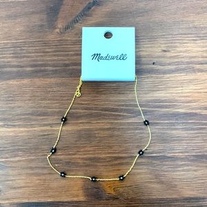 Madewell necklace.  NWT.  Pretty good chain with black beaded flowers.